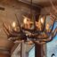  Unique Antler designs many whitetail chandeliers to light up your space perfectly. All of our chandeliers are made from real top grade antler. Every rosette and candelabras is polished to a shine. We use UL components and inspect all of our work. Our chandeliers come with everything you will need to install into a ceiling box along with a rusted chain color, chain color is available upon request along with more pictures. Our antler chandeliers come many sizes. 